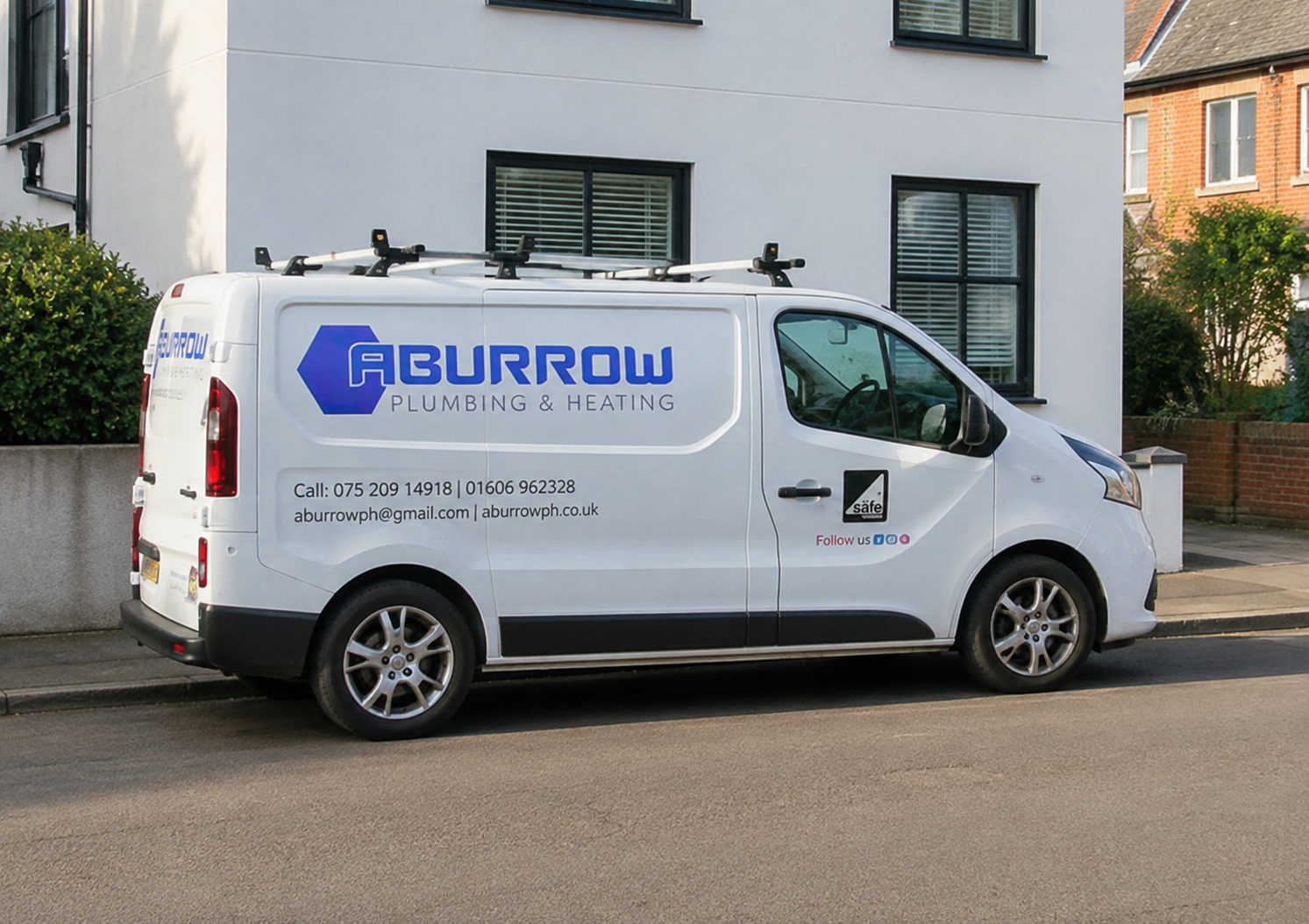 Aburrow van parked outside a home in Sussex