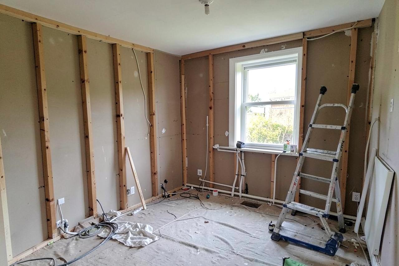 House renovation in progress with first fix pipework and cabling